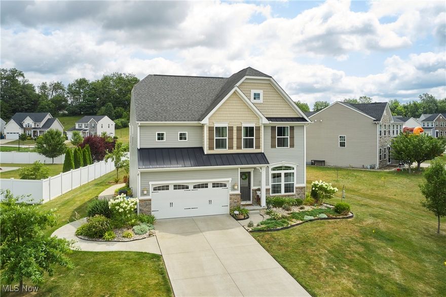 **OPEN HOUSE THIS SATURDAY, 8/9,CANCELLED** Tucked away in the scenic Lakes of Green community, this beautifully updated home at 2747 Compass Point Drive offers the perfect blend of comfort, convenience, and charm in the highly rated Green Local School District. Enjoy tranquil pond views and access to private stocked fishing ponds, all while being just minutes from many amenities including: shopping, restaurants, state parks trails, golfing, boating and excellent highway access. Inside, you’ll find a thoughtfully designed layout that makes everyday living easy. The main floor features a cozy front area perfect for an office or a peaceful reading nook, a convenient half bath, and a spacious Great Room with new flooring (2023). The upgraded eat-in kitchen flows seamlessly into a bright Morning Room, where sliding glass doors open to a concrete patio added in 2020—ideal for outdoor entertaining. A functional mudroom connects the kitchen to the attached two-car garage, offering everyday practicality. Upstairs, you’ll find four generously sized bedrooms, a full bathroom, and a convenient second-floor laundry room. The primary suite serves as a private retreat, complete with an ensuite bath featuring a garden tub, walk-in shower, and a spacious walk-in closet. Additional updates include new carpet upstairs and on the stairs (2022), a brand-new dishwasher (2025), a newer water heater (2024), and regular HVAC service by Apollo. There is currently monthly yard treatments by Mosquito Authority to add to the home’s low-maintenance lifestyle. With a full unfinished basement ready for your personal touch, this move-in-ready home checks every box. Don’t miss your chance to make it yours!