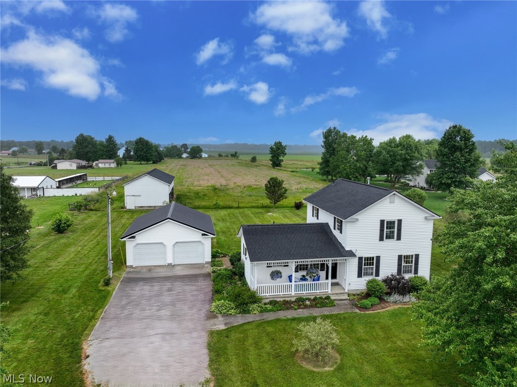 Don't Miss Your Opportunity to Own this 5 Acre Sustainable Mini Farm! This One Owner, Well Maintained Homestead, Features a Barn, 4 Bedrooms including a First Floor Master Bedroom! A Spacious Dining Room Opens to the Living Room Complete With Built Ins. The Fully Applianced, Freshly Painted Kitchen Offers a Large Pantry and Ample Cabinetry. A Convenient First Floor Laundry is Just Off the Master Bedroom. Upstairs are 3 Additional Bedrooms, and Another Full Bath. The Rear Patio is a Great Space to Enjoy the County side Views. Recent Updates Include: New Roof on Home and Barn, (2024), New AC/Heat Pump (2024), NEW SEPTIC System Being Installed, and Fresh Paint. Seller is Offering a Home Warranty for Additional Peace of Mind. Call Today for Your Private Showing!