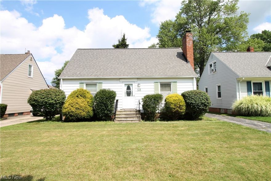 Welcome to this charming three-bedroom, one bath Cape Cod home conveniently located along bus route and close to shopping. Come on into the large living room offering a fireplace with mantle and large window to let the natural light to shine, beautiful wood floors throughout with the exception of the bathroom and kitchen, newer stainless-steel appliances, great counter space and lots of cabinets for all your storage needs. Dining room also has built ins for extra storage and updated lighting. The two bedrooms on the main level is equipped with a ceiling fan, and one bedroom has built-ins for extra storage and there is a full bathroom. Upstairs you have a large bedroom, office, rec room etc.  Full unfinished waterproofed basement, newer furnace, HWT and newer A/C. Laundry area and utility tub. Newer 3D roof. Fenced large backyard with one car detached garage. This home has it all! Move in ready!