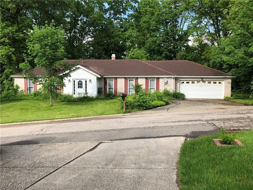 Lovely Ranch home in a great neighborhood just outside of town. Home has 3 bedrooms, 2 & 1/2 baths, large kitchen with gas fire place that could also be used as a great or family room. It has a two car attached garage, deck off of master suite and an in-ground swimming pool.