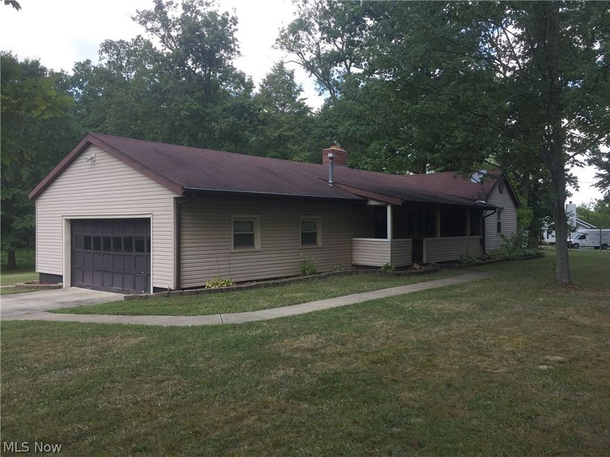 2.19 acres on a partially wooded lot in Sharon Township. The home currently has free gas. Very nice 32x48 outbuilding with upstairs storage. HMS Home Warranty. Possible third bedroom in the basement. The listing agent/broker is related to the seller.