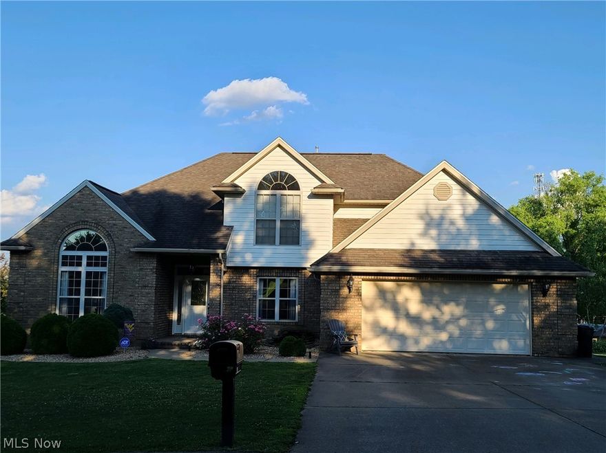 Don't miss this opportunity to live just minutes from the new Warren Local schools!!!  The property is located in the secluded White Oak Subdivision on a 0.5 acre lot and in close proximity to the fire station/EMS!   This spacious brick and cedar home includes 4 bedrooms and 3.5 baths.  Many updates have been made to this home! It has beautiful Brazilian hardwood floors located on the first floor, cathedral ceilings in the living room, built in cherry wall unit in the office/library, double vanities, garden tub, and walk in shower in the master bath.  Kitchen has corian countertops with great cabinet storage and a walk in pantry.  Laundry room is also located on the first floor.  Basement is partially finished and and could be used as a recreational/family room that includes a wet bar, full bathroom, and bonus area that could be used as a bedroom or crafting room.    Basement has poured walls and walk out access to 1/2 acre fenced in back yard, large composite deck for entertaining, and inground heated pool.  The pool was installed 2 years ago and is under warranty.  Attached 2 car garage has built in storage shelves.  Swing set and storage shed convey to new owners.  The subdivision road is presently being paved and will be completed shortly!  Call today to see this property before it's gone!!