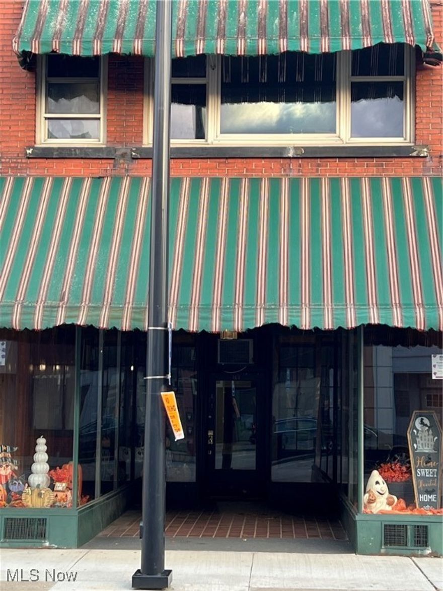 Commercial space for lease. Beautiful spot to open a business. Large area 100'@24'.  Heated Display windows add such a charm. Has a Bar and keg Cooler. Men's and Women's bathroom. High Ceilings with original Tin from the 1912's. Property is located in the Dora District which makes it even more appealing. There is an additional lot with building for parking or a possible patio. So many features makes this a great opportunity to start a dream business.