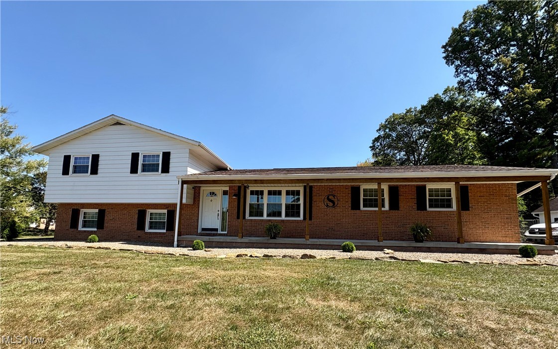 Welcome to 11121 Northwood Ave, NE! A wonderful 4 bed, 2 full bath split level home situated on almost a half-acre corner lot in the desirable Tusky Valley School System. Upon entering, you'll notice this home has been meticulously updated and maintained. You are greeted into the bright naturally lit living room which opens to the dinette area and fully applianced kitchen with hard-surfaced countertops. The sliding glass doors lead out to your fully fenced in backyard with deck and firepit, perfectly set up for entertaining. On the upper level, you'll find 3 generously sized bedrooms all with new carpeting, paint and light fixtures as well as the first of 2 full baths, with direct access to the Master bedroom. On the lower level you'll find the family room completely freshly painted from top to bottom with new carpeting and white-washed woodburning fireplace as well as the 4th bedroom, which could also serve as an office/mancave, and 2nd full bath. The basement level offers plenty of room for storage and the laundry area. There is also a 10x16 storage shed and 2-car attached garage that have also been meticulously maintained. You don't want to miss out on this one! Call your favorite realtor today!