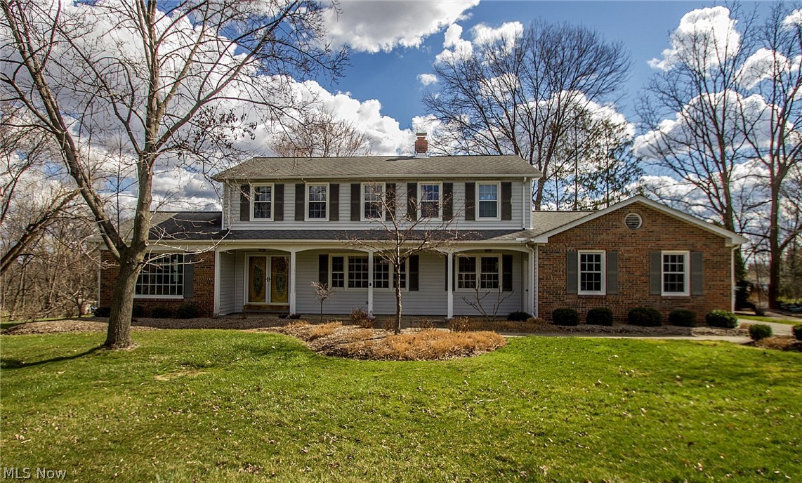 Brick Front Colonial With Front Porch, Attached Rear Entry Garage and Fenced Yard. Custom Concrete Patio and Play Structure To Stay. Kitchen With Travertine Floor, Granite Counters & Stainless Steel Appliances. Formal Living Room With Hardwood Flooring. Formal Dining Room With Cherry Wood Flooring and Family Room With Fireplace and Laminate Floor. Custom Hunter Douglas Blinds With Lifetime Warranty Throughout 1st Floor. Four Generous Sized Bedrooms Up, All With Hardwood Floors and Loads Of Closet Space. Finished Lower Level Ideal Play Area, Man Cave Or Recreation. Enjoy Brecksville Metro Parks, Recreation Center, Public Golf Course, Library and Fine Dining. Minutes To Freeway and Airport. Past 10 Years, Newer Windows, Kitchen Flooring, Landscaping, Furnace, Air & Roof. Call Today!!