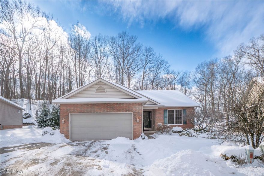 Enjoy worry-free condominium living in this beautifully maintained ranch-style condo located in desirable Jackson Township. A welcoming foyer with ample closet space opens to a bright, open-concept living and dining area featuring vaulted ceilings, hardwood floors, skylight, and a cozy gas fireplace—perfect for everyday living and entertaining.

The eat-in kitchen offers granite countertops, abundant cabinetry, stone backsplash, and fully applianced, with a dinette that provides plenty of natural light. The sun/4-season room is a true highlight, showcasing hardwood floors, vaulted ceilings, and scenic views, seamlessly flowing from the main living space.

The primary suite features hardwood flooring, a walk-in closet with organizer, and a spacious en-suite bath with dual sinks and a wheelchair-accessible walk-in tiled shower. A second bedroom, full bath, and convenient first-floor laundry with an a built in desk space complete the main level.

The finished lower level adds exceptional versatility with a large recreation room, wet bar (refrigerator included), half bath, bonus room/bedroom, workshop area, and abundant storage. Outdoor enjoyment continues with a covered patio and paver area, ideal for relaxing.

Additional highlights include a 2-car attached garage, brick exterior, and an association that covers landscaping, snow removal, trash, insurance, and common area maintenance. A fantastic opportunity for comfortable, low-maintenance living—schedule your showing today!