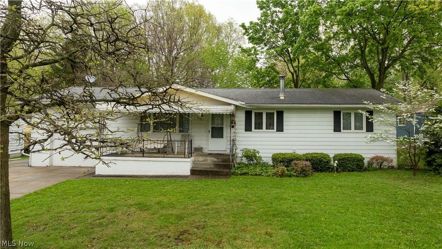 Nestled on a quiet street, in the heart of stow, you'll find this three bedroom ranch with a full basement. Hardwood floors can be found under its current carpet and run throughout most of the rooms. In the front room a welcoming wood burner stove can add a cozy feel for those chilly winter nights along with your main heat from your furnace. Don't worry, there is full a/c for those warm summers too. Watch the full blooms and activity in the back yard from the all season addition which adds an expansive space to the main floor kitchen/dining area. Read a book sitting on the covered front porch while you wave at your friendly neighbors. All appliances come with the house. House has been professionally waterproofed by Ohio State Waterproofing and comes with a lifetime warranty. The basement has many opportunities to have a recreation area, play room, office space, or "tickle the Ivories" on the piano which comes with the house. A separate laundry room & workshop area can also be found adj