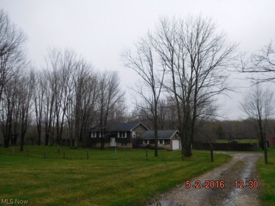 This home offers 4 bedrooms, 2 baths, lower level family room W/Woodburner Extra 12x12 computer or mud room. Kitchen W/Breakfast bar. Hardwood floors in dining & living rooms.Two tiered deck, 9 stall barn W/ electric & water. 4 Acres. Needs interior updating. Being sold as is.