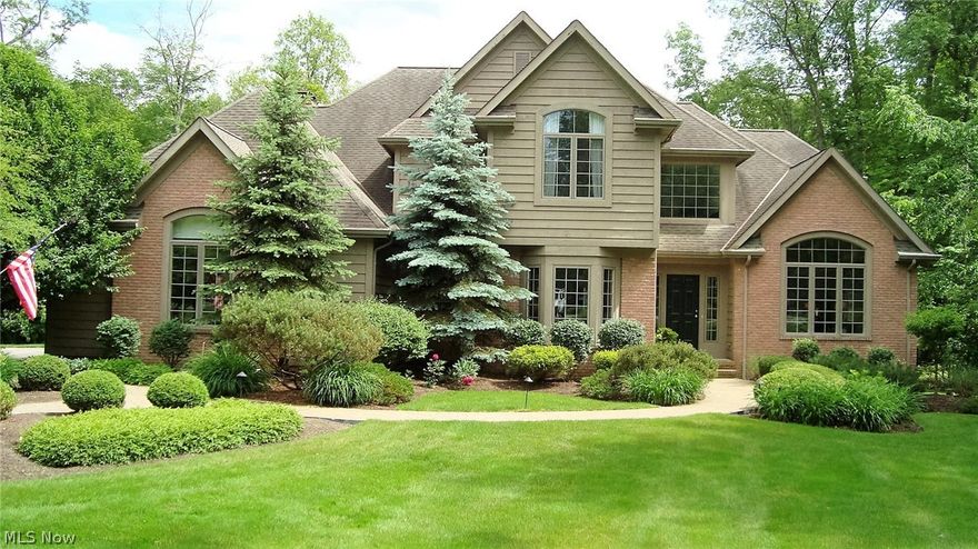 Welcome to this magnificent contemporary colonial set back in a rural like setting. This stunning house has all the desirable upgrades. Gourmet kitchen with island and custom cabinets. Formal dining area with gorgeous hardwood flooring. Large family room with custom built ins and wet bar, Large master w/glamour bath, sun room, full service generator, qualities throughout. Highly rated Kirtland school system. Also easy access to Interstate 90, shopping and the Holden Arboretum.  A one of a kind.