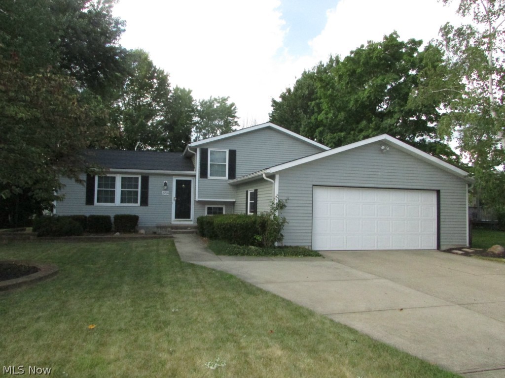 An exquisite 4 level split on a quiet Strongsville street. With 3 beds and 2 full baths, this lovely home features cork floors throughout the main level living area. The updated eat-in kitchen has newer granite counter tops and stainless steel appliances. A 23x20 Family Room features a delightful pellet stove. Both bathrooms are completely updated. The back yard is extremely private, and has a very large deck and fire pit. There is a heated 2 car attached garage, partially finished lowest level that has a transferable waterproofing warranty, laundry area, newer windows, and so much more.