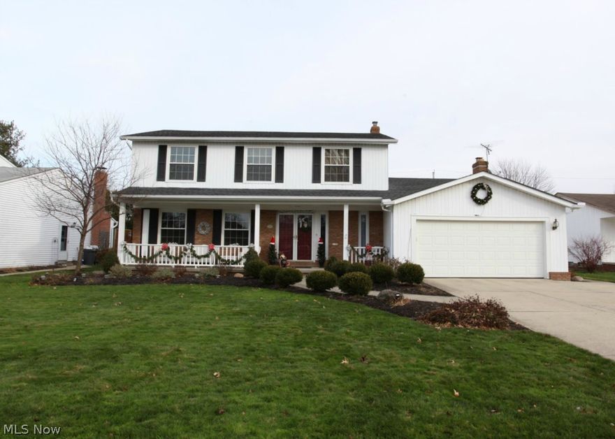 Move-in ready Colonial w/many updates!! Complete tear down roof 2007. New Vinyl Windows 2013. 2nd Floor Full bath gutted and remodeled 2013. Hot water tank 2013. Tile flooring in foyer 2013. Freshly painted 2013. New carpet 1st & 2nd floor 2013. Professionally landscaped 2010.  Large eat-in kitchen with Kraftmaid cabinets & Granite Countertops (2014) It is fully equipped w/all appliances (dishwasher & microwave only 1 year old), offers tons of cabinet & counter space & is open to the family room. A/C 2005. Garage door 2006. Great open floorplan. First floor half bath.  Family room has a woodburning fireplace and access to the stone patio in the fenced-in back yard.  Finished basement with brand new carpet, offers additional living space & storage.  Meticulously maintained. Wonderful neighborhood!