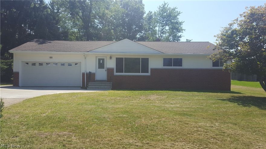 Charming home in Seven Hills. Upon entering this home, beautiful flooring greets you and takes you to the main living area. There is an open dining room that boasts the homes original French doors, giving it character. In the kitchen are new stainless steel appliances and it is updated very nicely. The hallway brings you to the three bedrooms this home offers, all with new carpeting. The bathroom is beautifully remodeled and has white wainscoting up the walls. There is a full basement. Windows throughout the house, as well as the water tank, panel box and a/c unit, are all new this year. There is also a high efficiency furnace that is newer. In 2006 a new roof was put on.