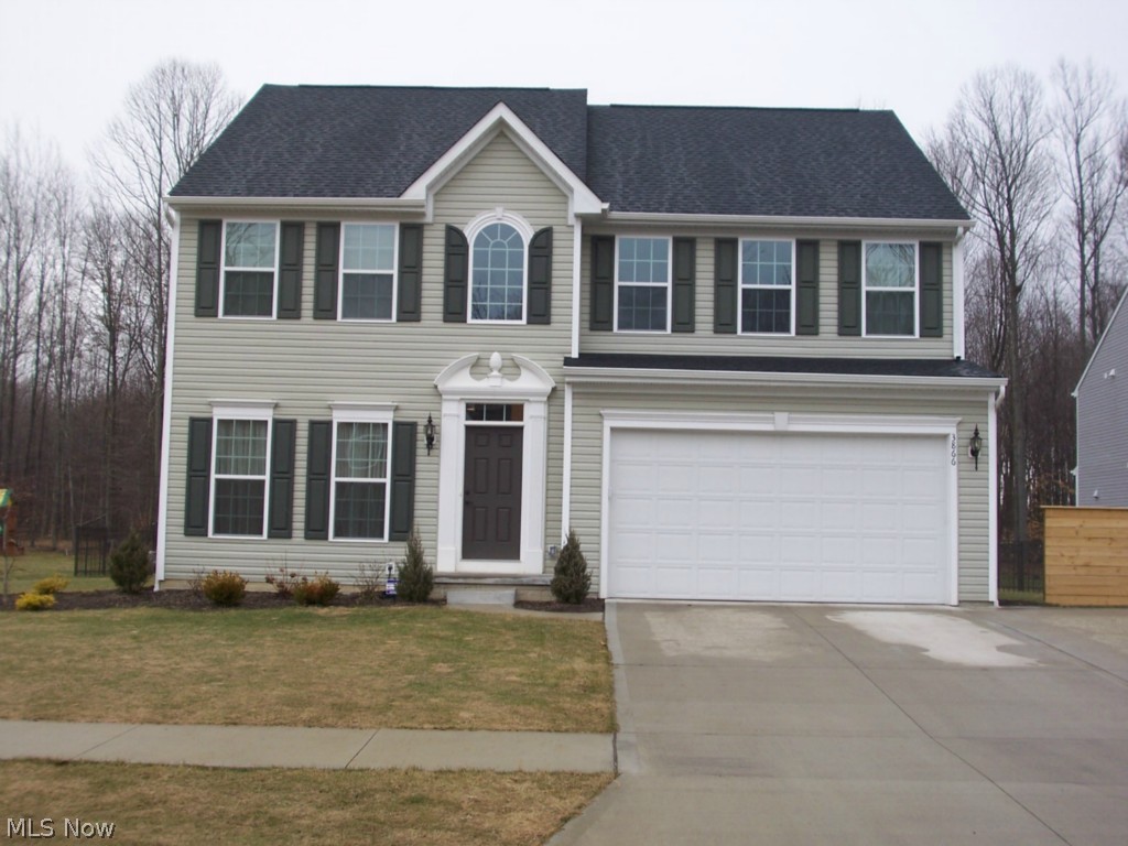 A remarkable colonial in Whispering Woods in Brimfield. This home was built with many upgrades. The kitchen has 42" cabinets, granite counter tops, wood floors, stainless steel appliances, and a large pantry. A morning room with large windows makes a comforting setting. The huge great room has a fireplace with stone all the way up to the 18' ceiling. The wood floors spread throughout the foyer, kitchen, morning room, and hallways. The finished basement adds approximately 625 additional square feet of livings space, with an egress window for safety and is plumbed for an additional bathroom. The 19x17 master suite has double sinks with granite counter top. Each bathroom has granite counter tops. The rear yard is completely fenced in with a large shed. This wonderful home is on a cul-de-sac, with 2 car garage with ample storage, an additional pad for parking, and a private lot.