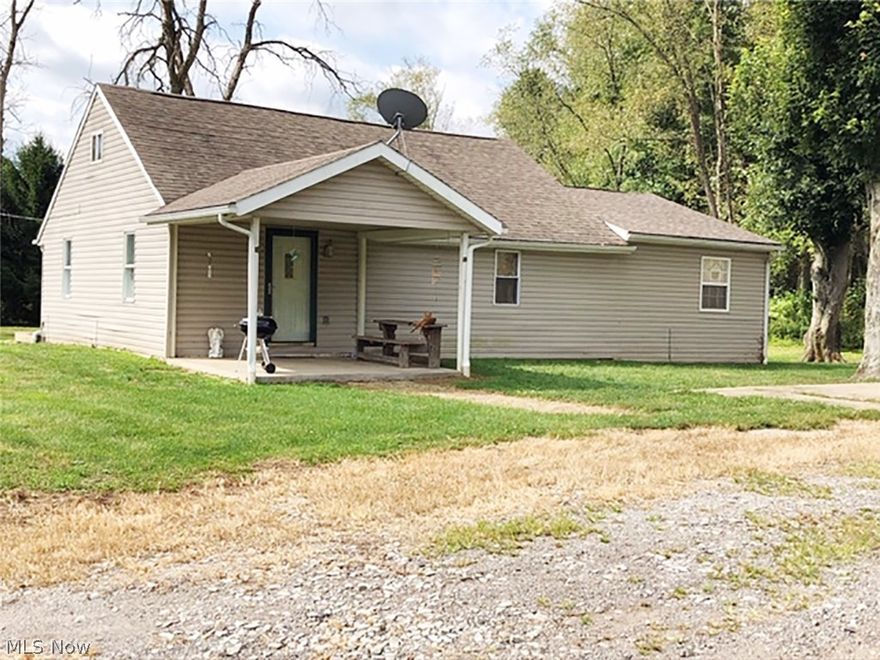 Updated three-bedroom home with 30x40 garage in Paris Twp., Stark co. - No zoning - Updated septic in 2014 - Home offers kitchen with dining area, living room, office area, two bedrooms and full bath on main level - Laundry/utility room also on main level - Electric heat pump with central air - Home was completely remodeled approx. 2011 - 30x40 pole building garage with three overhead doors - All situated on 3/4 acre country lot