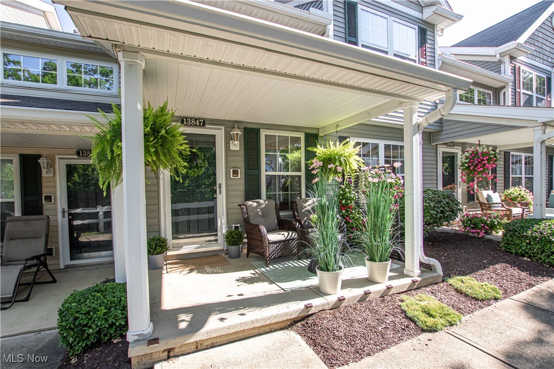 Immaculate 2 Bedroom 2.5 Bath Townhome Located In The Heart Of North Royalton! Relax On Your Cozy & Quiet Covered Front Porch! Inviting 2 Story Open Foyer & Generous Sized Living Room Welcomes You With A Plethora Of Natural Light! Updated Open Concept Kitchen Features Newer Cabinets, Counters, Backsplash, Flooring, Deep Farmhouse Sink & All Appliances Stay! Enjoy Entertaining Family & Friends In Your Large Dining Room! Remodeled Half Bath Includes Newer Toilet, Vanity & Flooring!! Convenient First Floor Laundry With New Mudroom Bench & Barn Door! Cute Little Under Stairs Doghouse Space For Your Favorite 4 Legged Family Members!! Make Your Way Upstairs Where You Will Find A Spacious Vaulted Ceiling Master Bedroom With En-Suite Full Bath, Separate Shower, Soaking Tub And Large Upgraded Walk-In Closet/Vanity/Dressing Room! Second Bedroom Has Attached Full Bath With Newer Toilet & Plenty Of Closet Space!! Additional Highlights Include Newer Lighting, Paint & Carpet Throughout, Blinds & Garage Door Opener!!