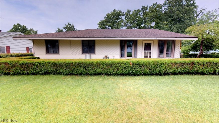 This unique sprawling ranch with lake views is a must see!! This little piece of heaven is perfect for entertaining or quiet Sundays. The patio adjacent to  drive and large garage/w full bath & carport offer an abundance of space for entertaining all with serene views of the lake. As you enter home you will find huge L shaped living room that has built-in cabinets and shelves and is large enough to have office area. The sun room is just that 'SUNNY"!! With full wall of windows and 3 large skylights it is bright and fun with beautiful views of Lake! The kitchen is also generous size offering lots of custom cabinets, counter space and unique corner sink, huge bay window boasting lake views from your table or the built in bistro style seating! Dining room is perfect for formal settings..or maybe a pool table or bar area featuring a garden window. Master bedroom is spacious with duel closets, parquet floors, big windows for lots of natural light and large master bath w/soaking tub. Watch s