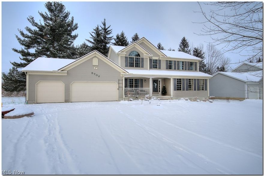 Spacious 2,800+  5 bedroom, 4 full bath vinyl sided colonial with 3 car garage on .52 acre lot!   First floor features a spacious living room with french doors leading to extra large family room with fireplace.   Huge eat-in kitchen with new Kitchen-aid Professional series stainless steel gas range, microwave and dishwasher along with center island with unique concrete counter top overlook family room.   Additional living suite with access to full bath and enclosed porch overlooking deck and private backyard with recently removed trees to provide additional sun!    First floor laundry and formal dining room complete the first floor plan.   2nd floor features a spacious master bedroom with vaulted ceiling, freshly painted master bath with updated hardware, soaking tub and separate shower; 3 additional roomy bedrooms and freshly painted guest bath with new laminate floor.     Fully finished lower level features an additional full bath and a 2nd kitchen - great for movie or poker night!