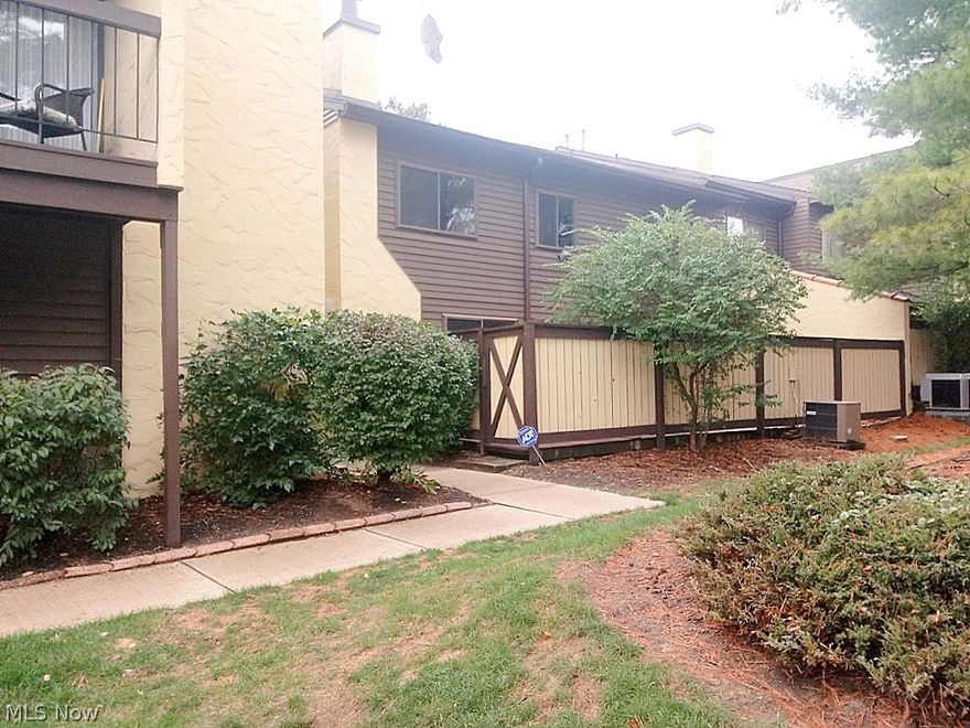 Very spacious contemporary Condo in Hampton Woods. 3-Bedrooms, 2-1/2 Bahts.  Convenient 2+ Car Garage.   Large Living and Family Rooms.  Gorgeous Kitchen with Granite Countertops, Ceramic Tile Floor, Stainless High-End Appliances including Gas Range, and Wine Rack, and beautiful Wood Cabinets.  Brand New Wood/Laminate Floors throughout the Living and Dining Areas. Gas Log Fireplace.   Brand New Carpeting in Bedrooms.  Ceiling Fans throughout.  2nd Floor Laundry.  Bright and Spacious Master Bath.  New Windows and Sliders in 2010.  Oversize Master Bedroom with Walk-in closet and Designer Tub.  Spacious Wood Deck and Patio.  Community Pool, Tennis Courts and Clubhouse.  Convenient to Shopping Malls, Restaurants, National Parks, Akron & Cleveland, and Interstates.