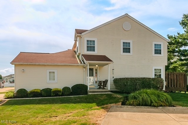Charming 2-Bedroom End Unit Colonial Condo in Willoughby! Welcome home to this beautifully updated colonial-style condo, perfectly situated as an end unit to offer extra square footage, abundant natural light, and enhanced privacy. Featuring two spacious bedrooms, three bathrooms, and a coveted two-car garage, this home is move-in ready and full of desirable features! Step onto the welcoming front porch and into a bright, open-concept main floor. The foyer flows seamlessly into the open concept living and kitchen areas, all showcasing newer hardwood floors. The kitchen has been updated with new cabinets, granite countertops, including room for a kitchen table. The living room is filled with natural light from the sliding glass doors leading to a private wooden deck. Upstairs, you'll find two generously sized bedrooms, both with double closets, vaulted ceilings, and plenty of sunlight. The primary bedroom connects directly to a large updated full bathroom, offering both comfort and convenience. The finished lower level provides flexible space for a guest suite, home office, or family room complete with a full bathroom. A separate utility/laundry room offers additional storage space. Additional highlights: two-car attached garage with opener, extra windows, and extra guest parking due to end unit location. Don’t miss your chance to own this turnkey home with flexible living spaces, updated finishes, and an unbeatable location. Just move right in!