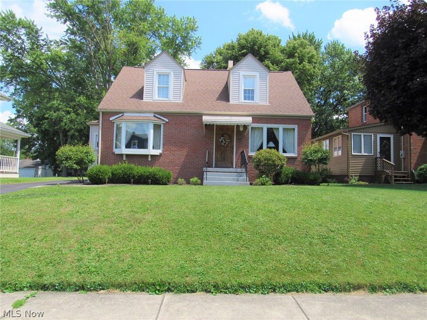 This lovely, well maintained home is spacious, at more than 1,700 sq ft. Through the front door, enter the large, open living and dining room. The gracious size of this space makes it perfect for hosting family and friends. The eat-in kitchen is equipped with ample cabinet & countertop space. No need to buy appliances, as they convey with the home. A mud room is conveniently located off the kitchen. Through the central hallway, the full bathroom/laundry area has newer vinyl flooring. The generous Primary bedroom has 2 large closets & glass French doors which provide a view to the beautiful adjoining  Sun Room. Glass doors in the Sun Room lead to the deck, which is a great spot to relax. An additional room which could be used as office, bedroom or whatever you choose, rounds out the main level. Upstairs, there are 3 bedrooms with built ins, a  full bathroom, plus abundant storage space. Outside, there is a concrete patio and 2 storage sheds. Many updates including a newer roof & tilt-in