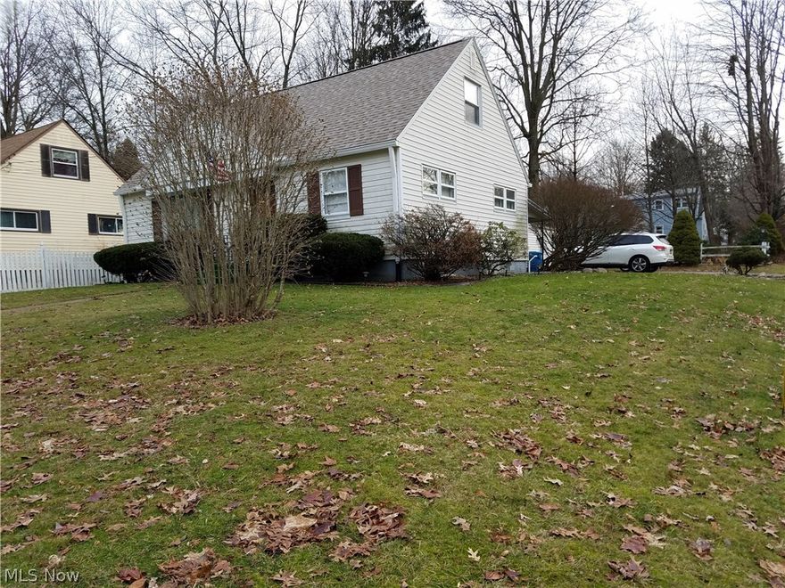 Great location and great updated home! Recent roof replacement with dimensional shingles, large cement patio, for relaxation and entertainment, gutters, and replacement windows, this home has 2 garages and a finished basement with a walkout door! 4 bedrooms and 2 full bathrooms (1 with shower and 1 with tub/shower) with updated kitchen featuring Corian countertops! Nice and bright with Natural light and great window layout! Two of the bedrooms are on the 1st floor with two additional bedrooms on the 2nd floor offer lots of alternative or multigenerational living options! The open feeling is highlighted by the dining room being open to the kitchen and the living room. There are beautiful hardwood floors in many areas, the kitchen has updated with white cabinetry and raised panel doors with hardware, built in dishwasher, a microwave and an electric cook top/oven. The basement level has a large finished area that can be used as 2 or 3 separate living areas and could easily accommodate a 5