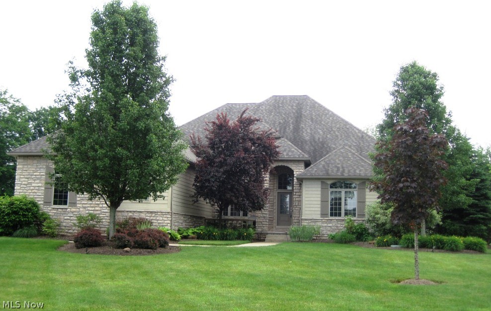Outstanding, custom built colonial boasts numerous updates and spectacular newer addition. Open floor plan w/pillared dining room & dramatic two story great room w/fireplace. French doors lead to library w/crown molding. Gourmet kitchen w/addition offers extended custom cabinetry, SS appliances, granite, 5 burner commercial range top & convection oven, built-in buffet w/warming ovens, and ceramic floors. Inviting hearth room highlights vaulted ceiling, frpl flanked by built-ins, and outdoor access. Luxurious FF master suite features tray ceiling, access to deck, spacious WIC, and glamour bath w/custom cabinetry, double vanity, jetted tub, and glass shower. FF laundry and separate mudroom. One en-suite, two additional,generous sized bedrooms w/J&J bath, & bonus/multi-purpose room complete the second level. Fabulous, finished LL boasts custom cabinets, built-ins, bar area, dance floor, media & workout rooms, 5th bedroom, full bath, & cedar closet. Private, wooded lot w/luscious landscape