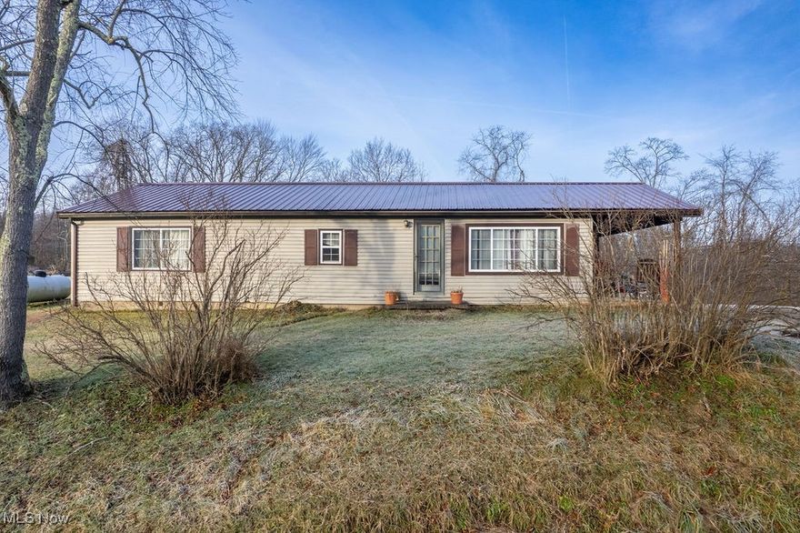 Opportunities like this are less about what is and more about what could be.



The highlight of this property is the land itself, offering a mostly cleared, sloping setting that opens the door to endless possibilities. It is easy to imagine garden beds taking shape, outdoor spaces designed for relaxing or entertaining, and a lifestyle that feels more connected to the outdoors. Toward the back of the property, a wooded edge adds privacy and natural beauty, with what appears to be a creek beyond the trees enhancing the peaceful atmosphere.



The home provides a meaningful starting point and the opportunity to bring fresh ideas and personal style into a space with existing character. With thoughtful updates and a creative vision, this is a place where improvements can truly reflect the next owner’s taste while adding long term value.



The outdoor potential is  endless. There is room for gardening, projects, and enjoying open space without feeling isolated. The location offers the best of both worlds with easy access to US Route 50 and I 77 while still feeling comfortably removed from the busyness of daily life.



If you are looking for a property that allows you to shape your surroundings and create something uniquely yours, this one invites you to imagine what could take root here.