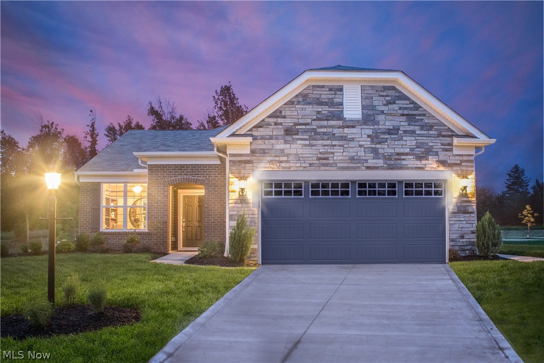 Pulte Homes' new “Castle Rock” ranch home in our recently Grand Opened community, The Enclave at Fieldstone Preserve, in Strongsville. The "Castle Rock" design greets you with open concept living the moment you enter the spacious foyer, with 9’ ceilings carried through-out and 6" wide plank laminate floors. The Den just off the foyer is a perfect space for a home office or hobby room, and the guest bedroom adjacent to a full bath is tucked away for privacy. The wide open super functional kitchen features a walk-in pantry, granite counters, white maple staggered cabinetry, Whirlpool Gold SS appliances, and an impressive 10 ft. island perfect for meal prep and entertaining. The open gathering room can host a crowd and the sunroom off the café boasts an abundance of natural light, the perfect space to start your day. In the back of the home the Owner's Suite includes plenty of natural light, a private owner’s bath with dual sinks, and large walk-in closet. This home also features an extra