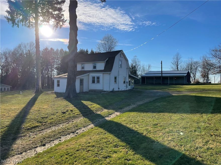 Completely Remodeled! Move in Ready! This 3 bedroom 1 bath home and barn sits on 2.61 beautiful acres in Ravenna Township. Inside the house you will find an updated kitchen with white cabinetry, all new flooring and fresh paint throughout. In addition to the new kitchen the main floor boasts a dining area, living room, and a bonus room which would make a great home office or playroom.  All three bedrooms with new carpet and full bath can be found on the second level.  The unfinished basement features a new hot water tank and a half bath with add on possibilities.  Enjoy spending time outdoors in the 34x48 barn, with a 14x48 foot lean to, or the 23x11 screened in porch area that spans the rear of the home. Definitely one you don't want to miss. Schedule your private showing today! ***Due to the overwhelming amount of interest in this property we are asking for HIGHEST and BEST OFFERS by 1:00pm MONDAY DEC. 5TH.***
