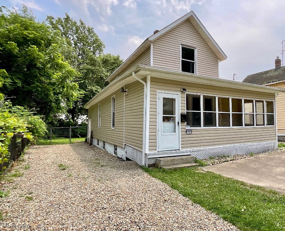 Welcome to 1063 Raymond St., Akron,Ohio!! This home has been completed remodeled and is an excellent investment. The first floor is spacious and cozy. The remodeled kitchen is a perfect place to prepare family meals. There is also a bedroom on the first floor. This home is large enough to host great family gatherings. It has lots of natural sunlight that creates a feeling of warmth and security. Upstairs are two carpeted bedrooms and a newly remodeled bathroom. The partially fenced in back yard is the perfect size for children to run and play. Priced to sell, this property is an excellent investment for the first time home owner or the retiree. Welcome home!!!