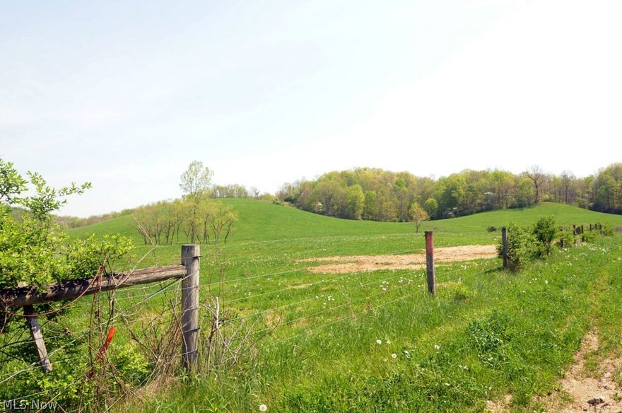 Exceptionally nice land with paved road frontage. Good fences and nice pastured. Only 2 1/2 mile to SR22 and 1 1/2 mile North of US40.