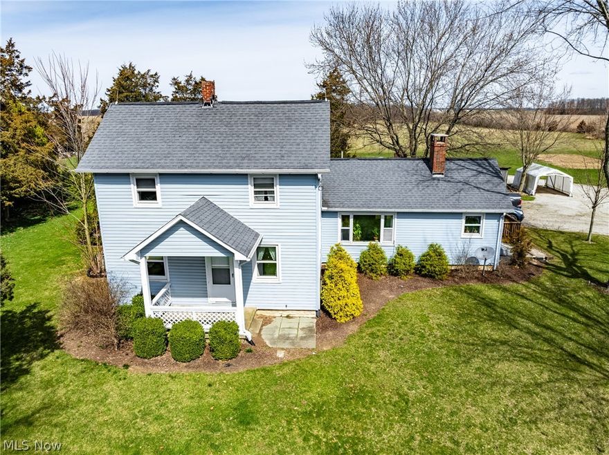 Looking for an Equestrian Property or Homestead? Charming 3 bedroom country homestead overlooking 27 rolling acres! Home features large living, family and dining areas, as well as an enclosed porch with stamped concrete floors. Enjoy the warmth of the wood burning fireplace in the cold season and the view from the deck in warmer times! Custom tile foyer w/ French doors...plus main floor laundry. Ample storage and multiple large windows allowing natural light throughout. Basement provides more storage or workshop type space and has an exterior entrance. Various fruit trees in small orchard next to house, approximately 8 acres of woods, 15 tillable acres, and a 56 x 36 pole barn w/ 18 x 17.5 workshop & 2 lofts, and 56 x 18 lean to, shed, greenhouse, and carport. This property is perfect for a horse lover or homesteader who's ready to live off the land! Multiple garden locations and room for additional barns, pasture, and/or recreation space! Don't miss this great opportunity!