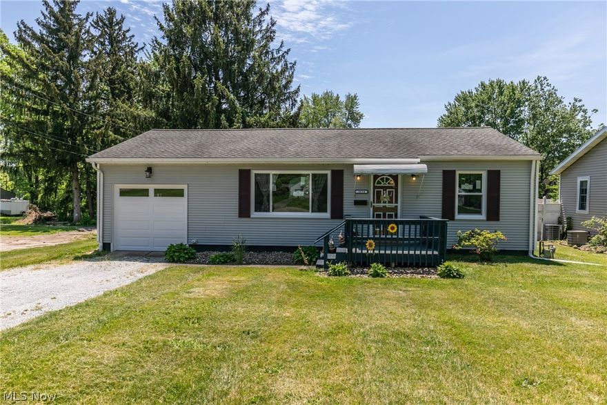 Welcome to this darling ranch in Mogadore! Walk straight into the living room which has a large picture window to allow for an abundance of natural light to shine in! You'll immediately notice the newer luxury vinyl plank flooring which flows into both bedrooms. A nice sized kitchen is complimented with white cupboards. The two bedrooms are well sized with neutral paint colors and flooring. Downstairs you have an ample amount of finished space for storage or a second living area. Walk out back to a charming covered back patio that looks out over your large backyard; the perfect spot for your summer cookouts. You'll also notice a new shed (with electric service) for extra storage. Attached is a one car garage with a new garage door. Other updates include brand new windows May 2021, updated roof, a/c and furnace new 2019! Do not miss out on this easy one floor living ranch in Mogadore!