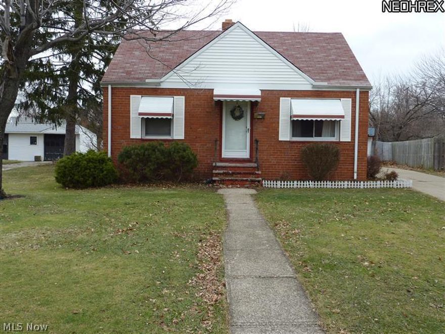 Enjoy a large rear lot with ample room for fun and games including a fenced area for a possible pool or dog run.  Off of East 250th, this well-built 3 bedroom brick bungalow has 2 first floor bedrooms, a 14' x 12' dormer up,15' living room, eat-in kitchen, a full basement, replacement windows, a newer hot water tank and a garage.  The golf course is at the end of the street. Call today for an appointment
