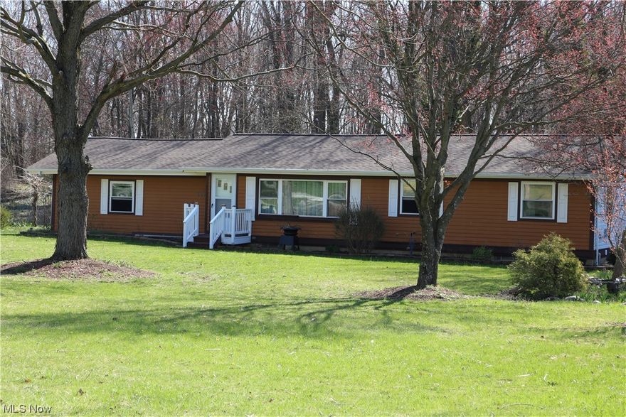 3 bedroom (with potential 4th bedroom on lower level) Ranch home in Green schools for UNDER 200K!!  Large opportunity here!..This houses not only offers a ton of potential, but it also sits on a little more than a half acre lot..on a dead end road/culdesac, and has an attached 2 car garage.  Just inside the front door you will find a large, comfortable living room with, original hardwood flooring and an abundance of natural light. Behind the living room there is a large, open kitchen with plenty of counter top and storage space,..and also a dining area with plenty of room for a table to share a meal while overlooking the private back yard.  The back of the house offers 3 large bedrooms, a full bathroom, and plenty of storage including built ins in the hallway for extra convenience.  Most of the lower level has been finished also that offers a potential 4th bedroom, and also a large family room that would be great for movies and/or games.  The outside offers a large 16 x 12 deck perfect