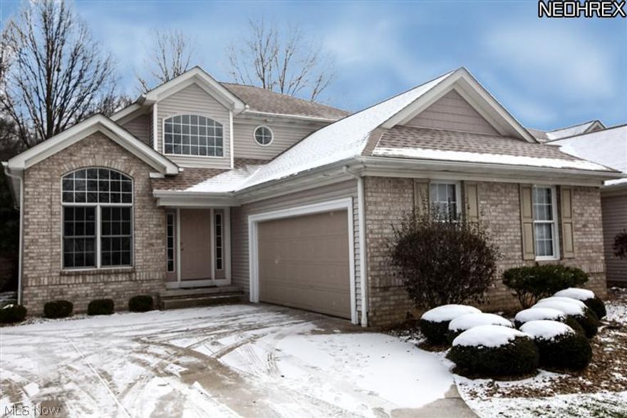 Size-Style-Comfort! A beautiful 2 bedroom,2.5 bath condo(only connected by garage wall) will amaze you from the moment you open the front door. An open floor plan concept with unique towering ceilings and an ideal 2nd floor with loft that offers additional square footage for all types of needs. You'll appreciate the first floor master suite with full bathroom and large walk in closet. Many extras designed for gracious living such as first floor laundry room,fireplace,glass french doors,deck and exterior balcony. A fabulous dining room that is large enough for you to display your beautiful china and silver! Nice bright kitchen with island and built-in appliances. You'll be sold when you see the full 12 coarse basement with walk in cedar closet. An attached 2 car garage with extra storage. An ideal end condo with a setting for entertainment with many amenities  for comfortable living!