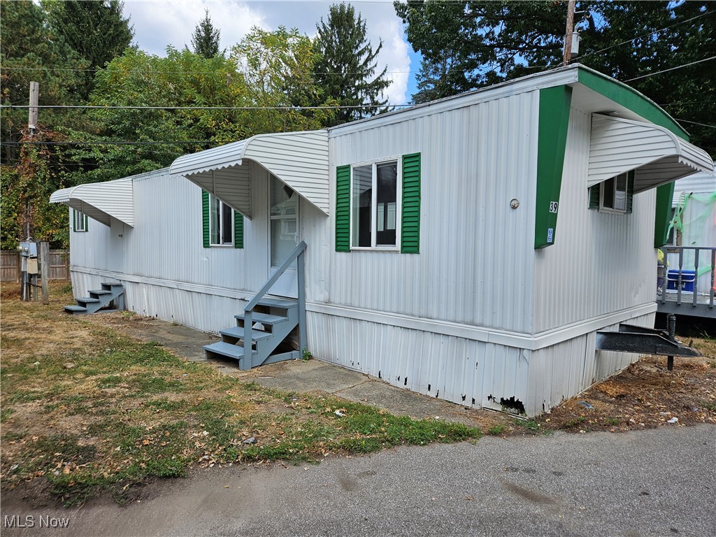 Nice, cozy mobile in a great location in the park! This mobile is ready to go! Freshly painted interior & new flooring. The floor plan offers an open kitchen to living room, 2 bedrooms, 1 full bath with laundry hook up. There is some additional green space at the back allowing room to enjoy the outside too! Conveniently located across from the Springfield Lake, close to the bus line, shopping, restaurants, library and minutes away from the expressway. Call today to schedule a time to view!