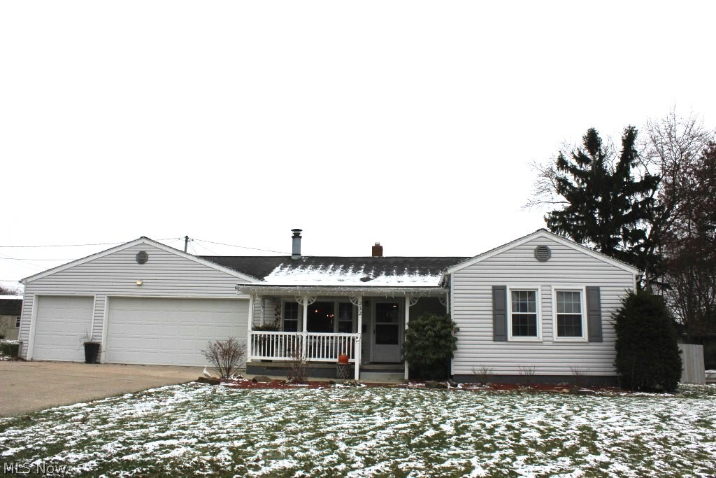 A must to see this beautifully updated ranch in the heart of the Park offering 3 bedrooms, 2 baths, 1356SF including finished rec room, double lot & heated 3 car garage* Open floor plan with wood floors throughout first floor, except kitchen & bathroom (porcelain wood like floor)* Living room with gas log free standing fireplace* Formal dining room* New kitchen with granite, stainless appliances (new range, refrig, dishwasher & microwave), stainless farm sink, disposal, breakfast bar/island, recessed lights & access to covered back porch* Sliding barn door to new bath with granite & tiled shower* Lower level rec room is light & bright with a full bath, Glass block windows & plenty of storage in unfinished part of basement* Full covered front porch* Heated & insulated 3 car garage* 2 lots (104x120) with 6' privacy fenced back yard with fire pit* windows approx 3-4 years*
* Newer hot water heater* Electrical box 2.5-3 yrs.* Neutral décor throughout* An absolute move in!