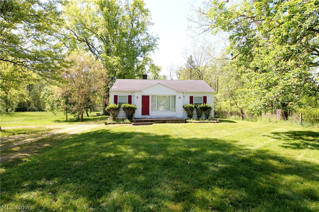 Acreage! Welcome to this charming three bedroom, one full bath ranch home on 1.16 acres. This home offers a large family room with windows to let the natural sunlight to shine through and a bright, eat in kitchen area with lots of cabinets. There is three bedrooms and a full bathroom on the main level. The lower level has a full unfinished basement and is very clean, plenty of space for storage. There is a chicken coop, shed in the very large beautiful backyard, plenty of room for entertaining or just sitting out relaxing. Very close to shopping area, eateries and schools. This home would be a great rental, or a home to make precious memories!