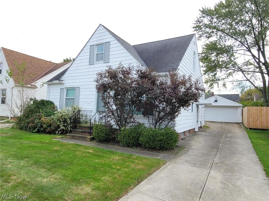 Welcome home to an Absolutely Fantastic Move-In-Ready Bungalow in Lovely Garfield Heights! This is the 3 Bedroom that you Simply Must see in person to fully appreciate! Featuring some great Quality of Life Amenities including:  Vinyl Replacement Windows, Granite Counters, a Fully Water Proofed Basement, Central Air, Modern Electric Service, 2 Car Garage, a 3-Season Enclosure to bring the Outdoors Inside...There's just too much to love about this home! Greeting you as soon as you walk into the front door are Sprawling Wood Floors in the Living Room and both First Floor Bedrooms. The Eat-In Kitchen is Gorgeous with Upgrades including Granite Counters, Undermount Single Basin Sink and a Direct Walk Out to the 3-Season Enclosure where you can both Entertain & Relax! The backyard Features Privacy Wood Fencing and a Generous Yard for the Summer Get-Togethers!  Looking for a Large Master Bedroom with BIG Cedar Walk In Closet... It's here and Offers Plenty of Room to Arrange Your Bedroom How Y