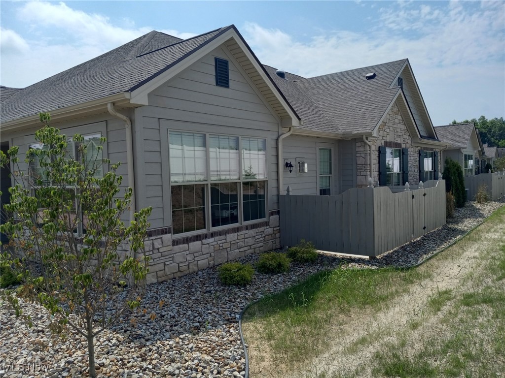 This AMAZING 2 Bedroom/2 & 1/2 Bath Condo is in The Desirable Courtyards at Stone Gate Development. The Rosewood Ranch is 1,965 SQ. FT with an Open Floor Plan, Island Kitchen, Lots of Light, and 10' Tray Ceilings. This Condo Features 2 Bedrooms Each with Their Own Bath, Half Bath, Sunroom, Patio with Optional Privacy Fence, and a 2+ Car Garage with Extra Storage.. This Property Is Great for Combined Families or Guests. This Condo is in Move In Condition & Available Immediately. Upgrades Include: White Cabinetry, Granite Countertops, Wood Laminate & Luxury Vinyl Plank Floors, Gas Fireplace, and more. Enjoy A Maintenance-Free Lifestyle with Exterior Repairs, Lawn Care, & Snow Removal Taken Care Of. The Community Features A Clubhouse, Outdoor Heated Saltwater Pool, 24/7 Fitness Center, And Social Events. Just Minutes to the Turnpike, Shopping, Medical Facilities, Dining, Entertainment & Parks. Pictures Representative of Actual Unit. FHA approved. Kitchen Appliance Allowance Available. ALL REASONABLE OFFERS WILL BE CONSIDERED!