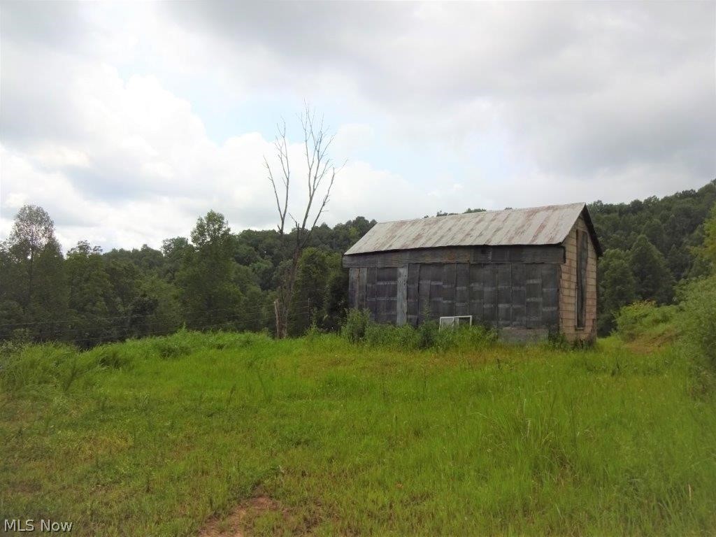 66 acres +/- excellent private location to build your cabin. Gravel road access, 3+ cleared, mostly wooded. No zoning or restrictions, old home for hunting camp, call for details. Approximately 7 miles to Spencer for shopping, restaurants and hospital Charles Fork Lake is about 4 miles for kayaking, fishing, hiking, etc.