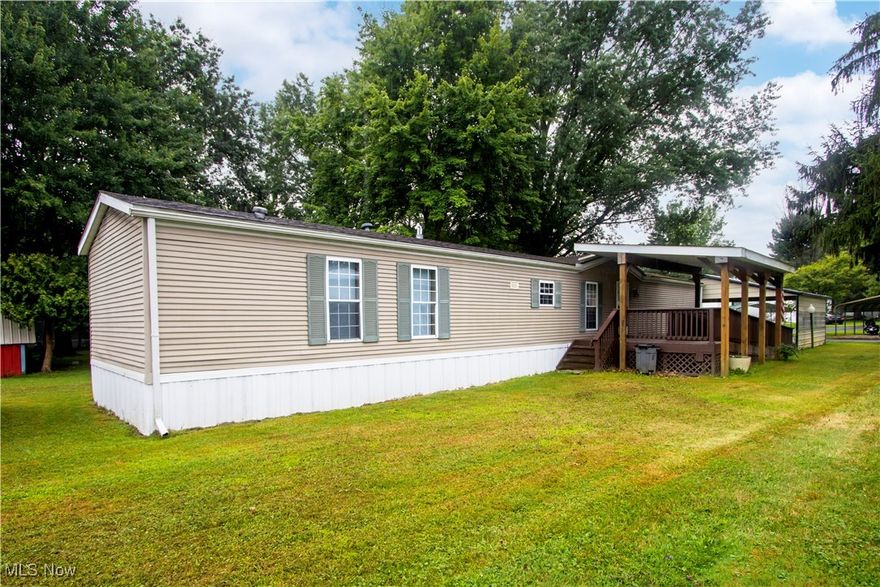 Welcome to 5852 Lot 44 Cleveland Road, Wooster – located in the quiet and well-kept Spruce Tree Mobile Home Park. This 1997 Spruce Ridge ES Kingsley model features 3 bedrooms and offers a clean, well-maintained interior surrounded by mature trees for added privacy and charm. Enjoy the convenience of a double-wide carport, a covered front porch, and a deck with an accessibility ramp.  Inside, you’ll find a bright and inviting space with new appliances that will transfer to the new owner, making this home truly move-in ready. A storage shed in the backyard provides extra room for tools, equipment, or seasonal items. Whether you're looking for affordable living or a low-maintenance home in a great Wooster location, this is one you don’t want to miss!