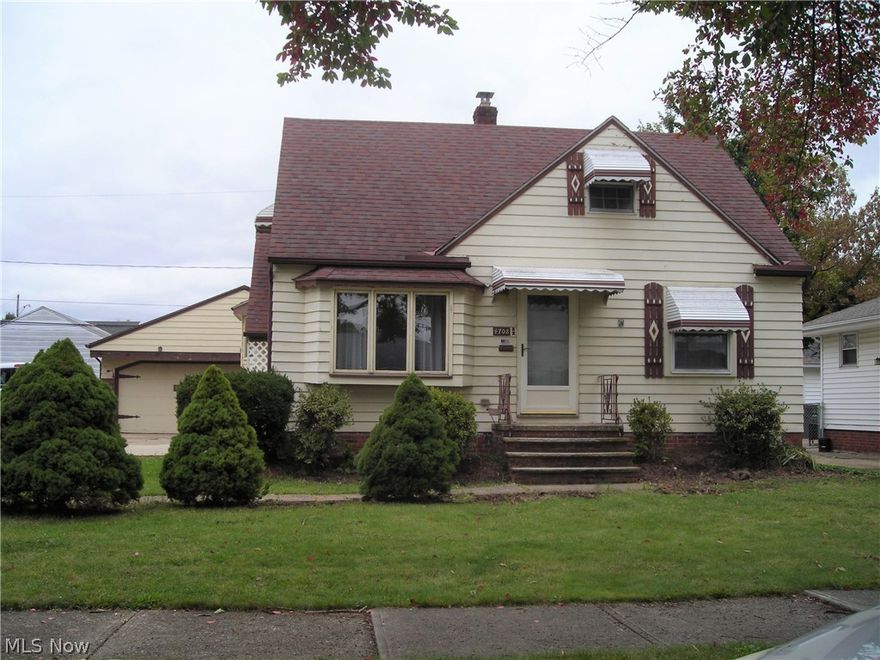 House was owned by a great woodworker who made all the cabinets, added plenty of counter space & specialty drawers. The small garden window offers ample light and with the custom shelves, you can add your favorite herb plants. Open basement with full bath, workshop, and rec room with mural painted on wall of mountains, lakes & streams. 2+ Car garage offers A/C, pull-down ladder for storage in attic and enclosed side patio for your enjoyment. Located on a dead-end street with a newly renovated playground & walking track. Brooklyn High School is at the other end of the street.