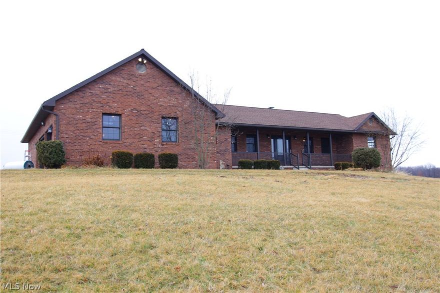 Take a look at this great brick ranch in the country! This home sits just outside of town on 4 beautiful acres overlooking a large pond. This home has been completely updated with all new lighting fixtures, paint, flooring, hardware, decking, doors and more. You will find an open concept floor plan throughout the kitchen, dining room and living room with vaulted ceilings . The 4 bedrooms are all great sized including a master with a double closet and a walk in closet as well as a private bathroom. This home has 2 full bathrooms, one half bath in the first floor laundry room and one half bath in the basement. The FULL unfinished basement has very tall ceilings, bathroom, exterior entrance and storage rooms. Perfect for adding even more finished square footage. There is an oversized 2 car attached garage with brand new garage doors. A brand new water line has been ran for county water access. This home is ready for you to move right in! Call today for a private showing, you won't be disa