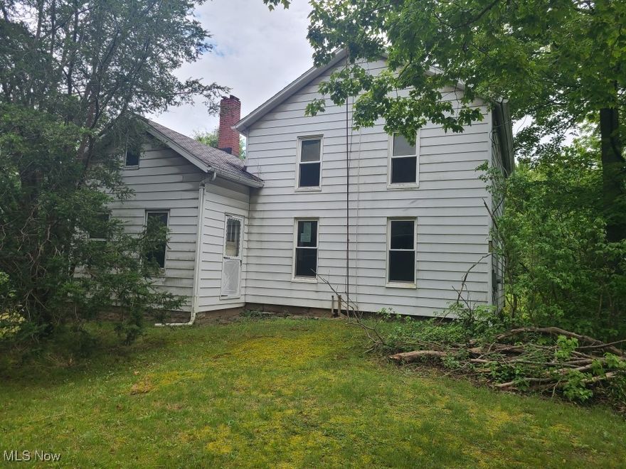 Century home on 2 acres offers 4 bedrooms, 2 baths, large living room, den, enclosed porch and large pantry.