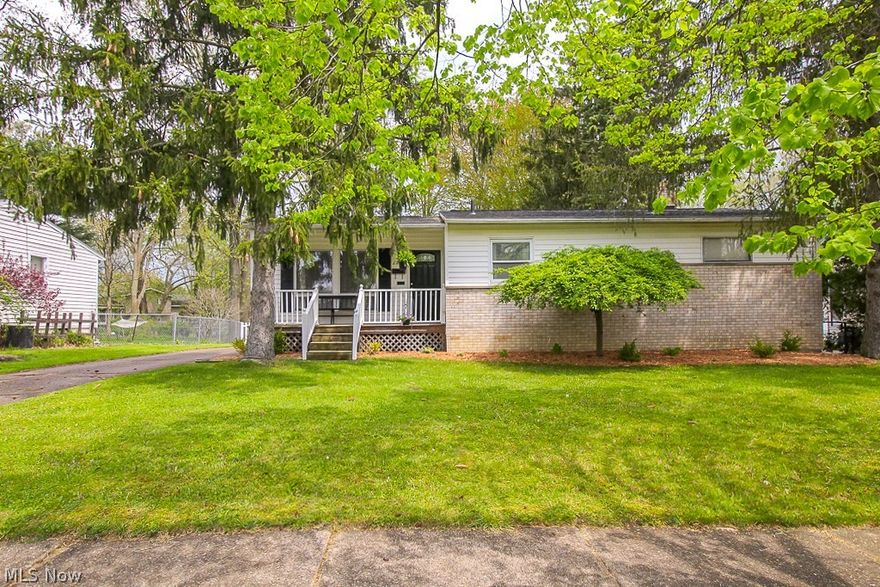 This is the home you've been waiting for!  This entire home has been renovated with the most beautiful updates.  Enter through the front door to a spacious, open concept living room, kitchen, and dining area.  The living room has vaulted ceilings, tons of open space, and an abundance of natural light beaming in from the large window and sky lights.  The kitchen features granite and beautiful cabinetry, newer stainless steel appliances, and updated flooring.  On the first floor there is a large master bedroom with a walk-in closet and master en-suite.  The updated half bath is convenient for guests, and separates the master from the second bedroom, which features beautiful original hardwood floors.  The full finished basement is the perfect space to use as a second living area, with a built in bar, ideal for relaxing or entertaining.  This level features a second full bathroom, laundry room, and third bedroom.  The outside of the home is just as beautiful and relaxing as the inside, wit