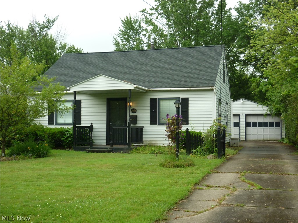 Move-in ready cape cod, featuring first floor bedrooms, bath and laundry area.