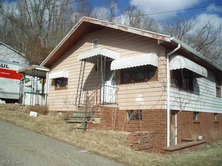 "AS IS" Where is. Three bedroom ranch needing a new owner. True honey for the money.