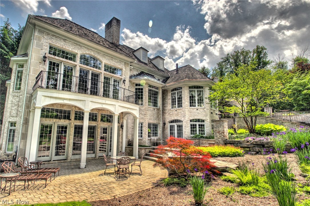 Absolute dream! Unbelievable Georgian mansion on 5 magnificent acres. Every room was carefully designed and constructed to create a truly remarkable estate. This stunning showpiece is definitely the Country Club lifestyle you have been waiting for! This estate features 9 fabulous bedrooms, 13 glamorous bathrooms, 9 fireplaces, and located on very private, lush grounds. Once inside you'll notice the elegance along with the everyday comforts every family needs. An incredible list of amenities including an elevator, multiple balconies and patios, ponds, waterfalls, billiards room, impressive in-ground pool with hidden tubular water slide, cabana/pool house with bar and full bathroom, this home has it all!